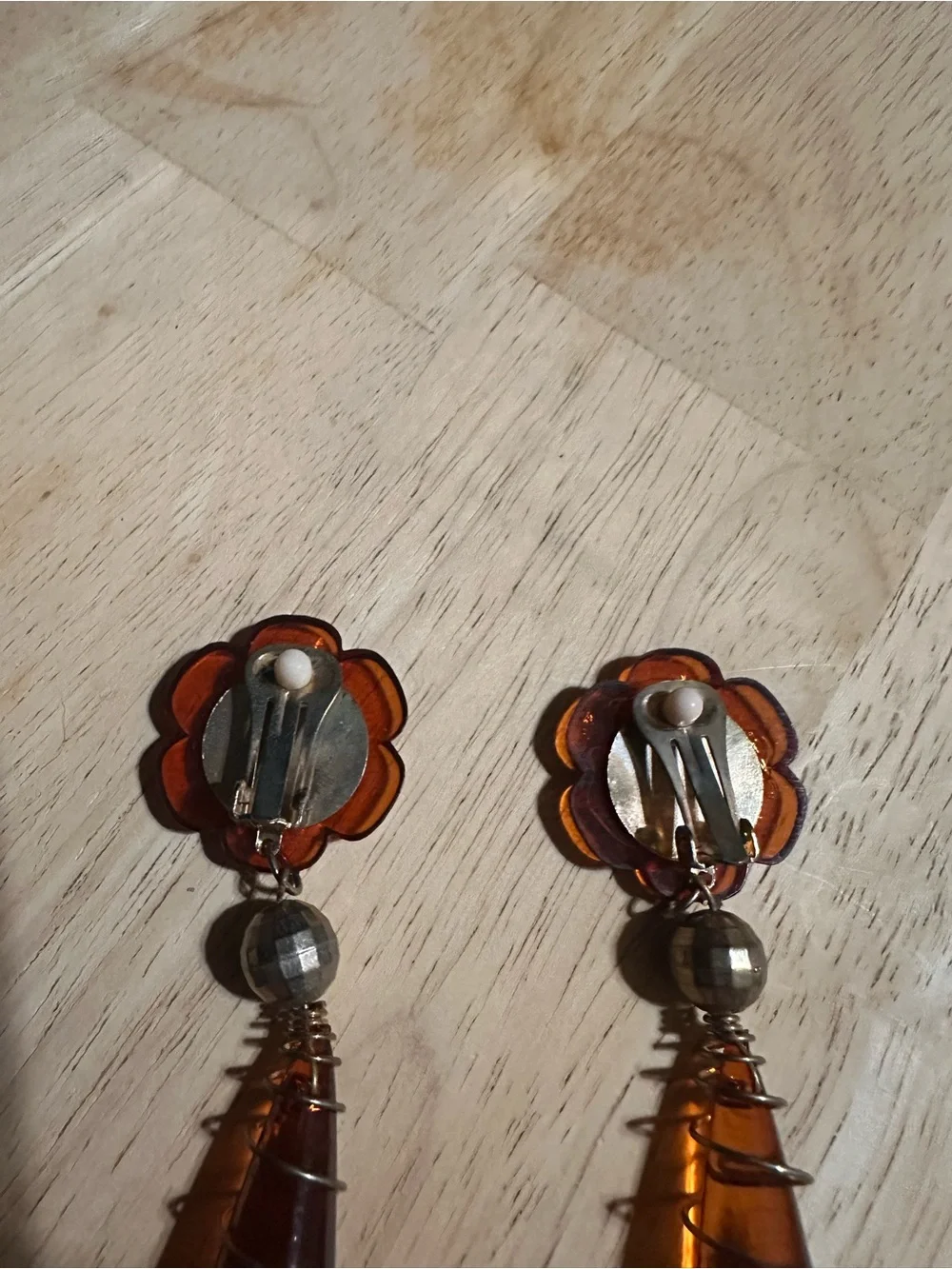 1990s amber Lucite flower and wire-wrapped teardrop dangle clip-on earrings